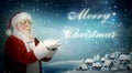 Santa Claus blowing snow Ã¢â¬ÅMerry ChristmasÃ¢â¬Â Royalty Free Stock Photo